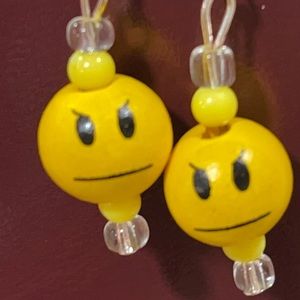 Grumpy face earrings